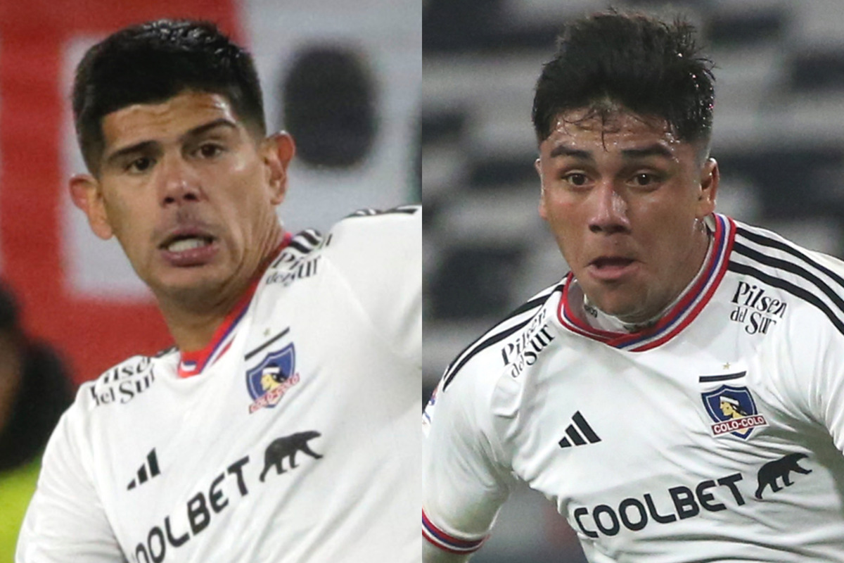 Esteban Pavez y Damián Pizarro disputando un partido con la camiseta de Colo-Colo.