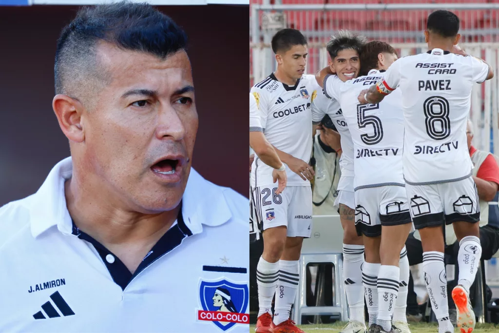 Primer plano de Jorge Almirón. Jugadores de Colo-Colo abrazándose.