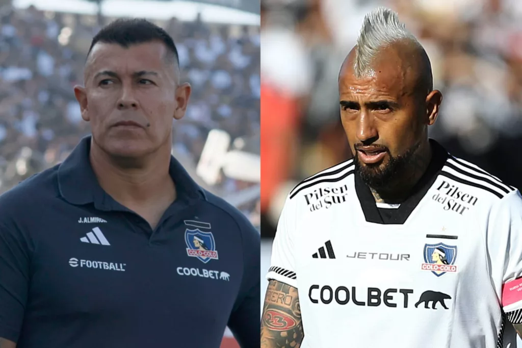 Primer plano a Jorge Almirón y Arturo Vidal con rostros serios e indumentaria de Colo-Colo.