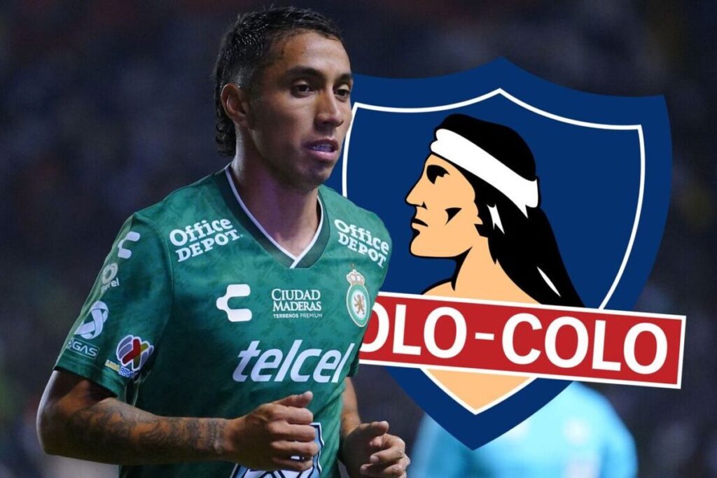 Primer plano de Luciano Cabral junto al escudo de Colo-Colo.